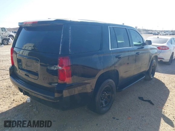 2015 Chevrolet Tahoe Commercial z VIN 1GNLC2EC7FR575386, wystawiony jako IAAI lot #41836137 z przebiegiem 143 231 mil mil oraz . Historia ofert i sprzedaży dostępna na DreamBid. Obrazek 4.