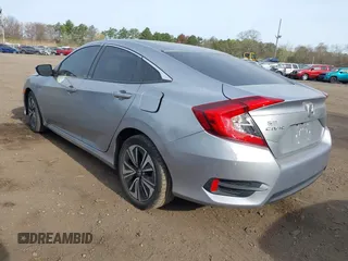 2018 Honda Civic Sedan LX with VIN 2HGFC2F5XJH573938, listed as a IAAI auction lot 42098109 with 69,037 mi miles. Bid and sale history available at carsss.com. Image 3.