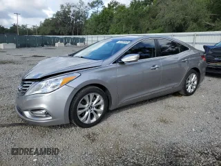 2013 Hyundai Azera z VIN KMHFG4JG3DA209396, wystawiony jako Copart lot #55789595 z przebiegiem 154 665 mil mil oraz Szkoda całkowita • Salvage title. Historia ofert i sprzedaży dostępna na DreamBid. Obrazek 1.