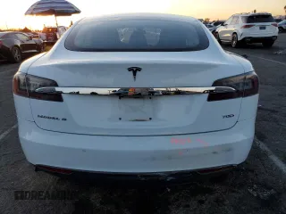 2015 Tesla Model S 85D with VIN 5YJSA1S21FF087461, listed as a Copart auction lot 87027334 with 53,868 mi miles and Salvage Title. Bid and sale history available at carsss.com. Image 6.