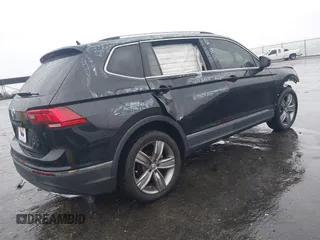 2021 Volkswagen Tiguan SE with VIN 3VV3B7AX3MM058751, listed as a IAAI auction lot 41527365 with 19,646 mi miles and . Bid and sale history available at DreamBid. Image 4.
