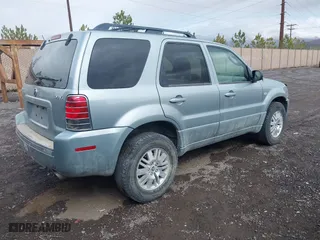 2005 Mercury Mariner Luxury with VIN 4M2CU57145DJ22822, listed as a IAAI auction lot 41932692 with 167,263 mi miles. Bid and sale history available at carsss.com. Image 4.