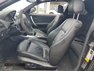 2012 BMW 1 Series 135i with VIN WBAUC9C5XCVM12807, listed as a Copart auction lot 61680225 with 117,314 mi miles and Salvage title. Bid and sale history available at DreamBid. Image 7.