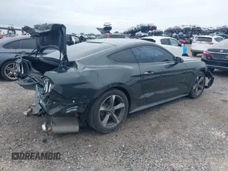 2015 Ford Mustang V6 with VIN 1FA6P8AM3F5344333, listed as a IAAI auction lot 42623531 with 121,278 mi miles and . Bid and sale history available at DreamBid. Image 4.