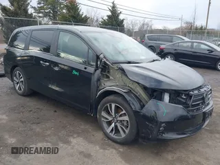 2023 Honda Odyssey Touring with VIN 5FNRL6H81PB068721, listed as a IAAI auction lot 41489618 with 20,202 mi miles and . Bid and sale history available at DreamBid. Image 1.