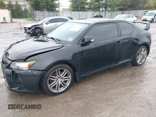 2013 Scion tC with VIN JTKJF5C79D3051664, listed as a IAAI auction lot 42027579 with 211,322 mi miles. Bid and sale history available at carsss.com. Image 2.