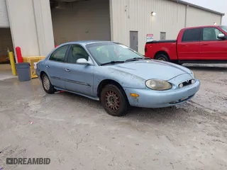 1997 Mercury Sable LS with VIN 1MELM53S0VG648365, listed as a IAAI auction lot 41501814 with 256,352 mi miles. Bid and sale history available at carsss.com. Image 1.
