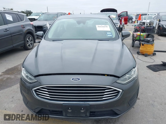 2019 Ford Fusion S with VIN 3FA6P0G79KR215541, listed as a IAAI auction lot 41626638 with 73,751 mi miles and . Bid and sale history available at DreamBid. Image 12.