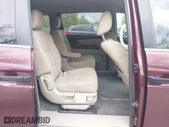 2013 Honda Odyssey LX with VIN 5FNRL5H25DB080209, listed as a IAAI auction lot 42123644 with 157,631 mi miles and . Bid and sale history available at carsss.com. Image 8.
