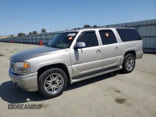 2006 GMC Yukon XL with VIN 1GKFK66U36J134459, listed as a Copart auction lot 55802165 with 277,366 mi miles and Salvage title. Bid and sale history available at DreamBid. Image 1.