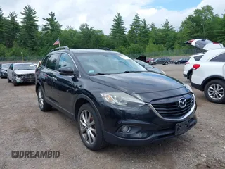 2014 Mazda CX-9 Grand Touring with VIN JM3TB3DV8E0432624, listed as a IAAI auction lot 42702421 with 167,813 mi miles and . Bid and sale history available at DreamBid. Image 1.
