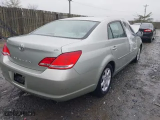 2007 Toyota Avalon XL with VIN 4T1BK36B27U236094, listed as a IAAI auction lot 42025285 with 208,741 mi miles. Bid and sale history available at carsss.com. Image 4.