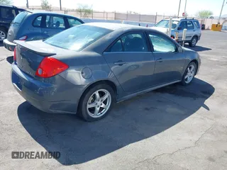 2009 Pontiac G6 GT 1SB z VIN 1G2ZK57K594234408, wystawiony jako IAAI lot #42547870 z przebiegiem 206 547 mil mil oraz . Historia ofert i sprzedaży dostępna na DreamBid. Obrazek 4.