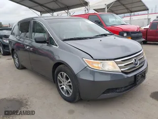 2011 Honda Odyssey EX-L with VIN 5FNRL5H66BB015305, listed as a IAAI auction lot 42065872 with 190,580 mi miles. Bid and sale history available at carsss.com. Image 1.