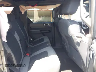2021 Ford Bronco с VIN 1FMDE5BH2MLB03794, выставлен на аукционе IAAI как лот 42180534 с пробегом 59 807 миль миль и . История ставок и продаж доступна на DreamBid. Изображение 8.
