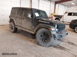 2020 Jeep Wrangler Unlimited Sport Altitude with VIN 1C4HJXDG4LW120627, listed as a IAAI auction lot 41728593 with 63,565 mi miles. Bid and sale history available at carsss.com. Image 1.