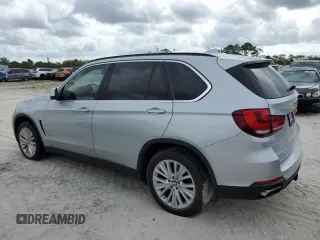 2015 BMW X5 xDrive50i with VIN 5UXKR6C51F0J74160, listed as a Copart auction lot 79337044 with 143,436 mi miles and Salvage title. Bid and sale history available at DreamBid. Image 2.