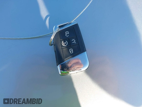 2021 Volkswagen Atlas SE z VIN 1V2JE2CA8MC237781, wystawiony jako IAAI lot #42404797 z przebiegiem Nie podano mil oraz . Historia ofert i sprzedaży dostępna na DreamBid. Obrazek 11.