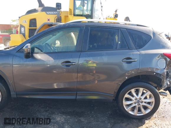 2014 Mazda CX-5 Grand Touring with VIN JM3KE4DY2E0312952, listed as a IAAI auction lot 42138721 with 99,993 mi miles and . Bid and sale history available at DreamBid. Image 14.