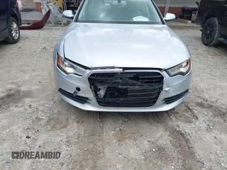 2015 Audi A6 Premium z VIN WAUCFAFC7FN034531, wystawiony jako IAAI lot #42172539 z przebiegiem 57 565 mil mil oraz . Historia ofert i sprzedaży dostępna na DreamBid. Obrazek 6.