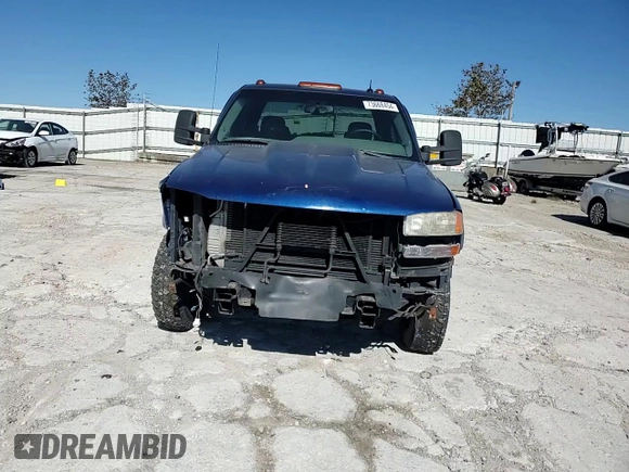2003 GMC Sierra 3500 SLT z VIN 1GTJC33113F121042, wystawiony jako Copart lot #73668454 z przebiegiem 246 510 mil mil oraz Szkody całkowita. Historia ofert i sprzedaży dostępna na DreamBid. Obrazek 11.