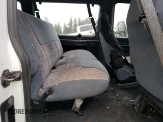 1994 Ford Econoline Wagon XL z VIN 1FBJS31H1RHB32773, wystawiony jako Copart lot #82008864 z przebiegiem Nie podano mil oraz Tytuł czysty. Historia ofert i sprzedaży dostępna na DreamBid. Obrazek 11.