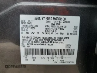 2017 Ford Edge Titanium z VIN 2FMPK4K86HBB78326, wystawiony jako Copart lot #54699435 z przebiegiem 44 800 mil mil oraz Szkoda całkowita • Salvage title. Historia ofert i sprzedaży dostępna na DreamBid. Obrazek 13.