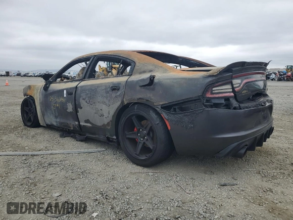 2016 Dodge Charger R/T with VIN 2C3CDXCT5GH302085, listed as a Copart auction lot 57583955 with Not provided miles and Non repairable. Bid and sale history available at DreamBid. Image 2.
