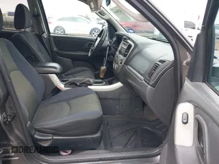 2005 Mazda Tribute S with VIN 4F2YZ04135KM05678, listed as a IAAI auction lot 42194083 with 283,488 mi miles and . Bid and sale history available at carsss.com. Image 5.