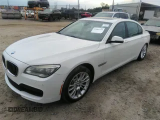 2015 BMW 7 Series 750Li with VIN WBAYE8C50FD781160, listed as a IAAI auction lot 41061232 with 154,496 mi miles. Bid and sale history available at carsss.com. Image 18.