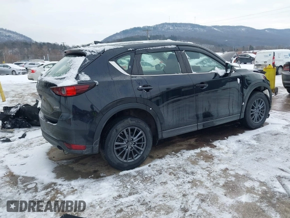 2019 Mazda CX-5 Sport with VIN JM3KFBBM8K1621929, listed as a IAAI auction lot 41356228 with 67,023 mi miles and . Bid and sale history available at DreamBid. Image 4.