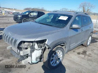 2020 Jeep Cherokee Latitude with VIN 1C4PJLCB0LD536471, listed as a IAAI auction lot 41680568 with 150,397 mi miles and . Bid and sale history available at DreamBid. Image 2.