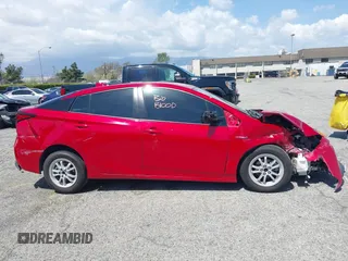 2020 Toyota Prius L Eco z VIN JTDKARFU0L3109596, wystawiony jako IAAI lot #41950366 z przebiegiem Nie podano mil oraz . Historia ofert i sprzedaży dostępna na DreamBid. Obrazek 12.