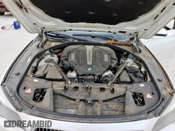 2012 BMW 7 Series 750Li xDrive with VIN WBAKC8C5XCC436134, listed as a Copart auction lot 63144905 with 64,282 mi miles and Salvage title. Bid and sale history available at DreamBid. Image 11.
