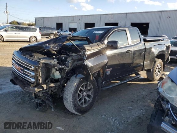 2015 GMC Canyon 4WD SLE with VIN 1GTH6BE33F1199189, listed as a Copart auction lot 87191114 with 199,477 mi miles and Salvage Title. Bid and sale history available at carsss.com. Image 1.