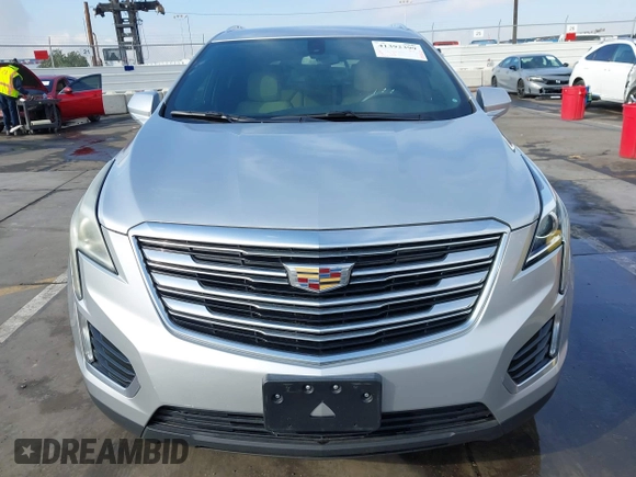 2017 Cadillac XT5 FWD with VIN 1GYKNARS7HZ144148, listed as a IAAI auction lot 41392399 with 96,252 mi miles and . Bid and sale history available at carsss.com. Image 12.
