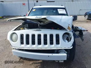 2014 Jeep Patriot Sport with VIN 1C4NJPBA8ED772974, listed as a IAAI auction lot 42401827 with 140,761 mi miles and . Bid and sale history available at DreamBid. Image 6.