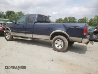 2002 Ford F-150 XL z VIN 1FTRX18L12NB86774, wystawiony jako Copart lot #59634165 z przebiegiem 262 567 mil mil oraz Szkoda całkowita • Salvage title. Historia ofert i sprzedaży dostępna na DreamBid. Obrazek 2.