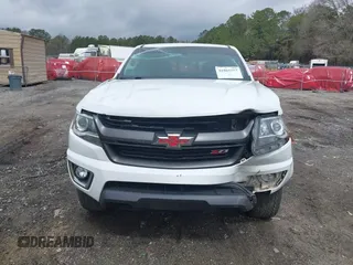 2020 Chevrolet Colorado 4WD Z71 with VIN 1GCGTDEN6L1228309, listed as a IAAI auction lot 41865357 with 100,560 mi miles and . Bid and sale history available at DreamBid. Image 12.