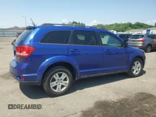 2012 Dodge Journey SXT with VIN 3C4PDCBB6CT324709, listed as a Copart auction lot 63300405 with 179,946 mi miles and Salvage title. Bid and sale history available at DreamBid. Image 3.
