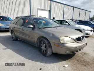 2003 Mercury Sable LS Premium z VIN 1MEFM59S03A606329, wystawiony jako Copart lot #79331624 z przebiegiem 152 059 mil mil oraz Nie do naprawy. Historia ofert i sprzedaży dostępna na DreamBid. Obrazek 4.