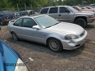 2000 Honda Civic EX z VIN 1HGEJ8247YL022770, wystawiony jako Copart lot #58949795 z przebiegiem 139 099 mil mil oraz Szkoda całkowita • Salvage title. Historia ofert i sprzedaży dostępna na DreamBid. Obrazek 4.