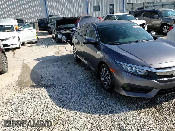 2017 Honda Civic EX z VIN 2HGFC2F78HH549794, wystawiony jako Copart lot #54592675 z przebiegiem 45 079 mil mil oraz Szkoda całkowita • Salvage title. Historia ofert i sprzedaży dostępna na DreamBid. Obrazek 13.
