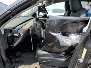 2023 Tesla Model Y Long Range with VIN 7SAYGDEE4PF899390, listed as a Copart auction lot 54361685 with Not Provided miles and Clean Title. Bid and sale history available at DreamBid. Image 7.
