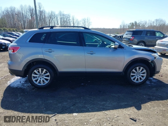 2008 Mazda CX-9 Grand Touring z VIN JM3TB38A780159798, wystawiony jako IAAI lot #41775580 z przebiegiem 119 147 mil mil oraz . Historia ofert i sprzedaży dostępna na DreamBid. Obrazek 13.
