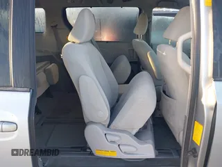 2014 Toyota Sienna LE AAS with VIN 5TDKK3DC1ES520561, listed as a IAAI auction lot 41959565 with 115,908 mi miles and . Bid and sale history available at carsss.com. Image 8.