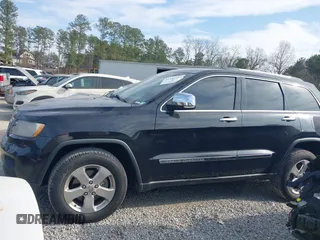 2013 Jeep Grand Cherokee Limited with VIN 1C4RJEBGXDC520609, listed as a IAAI auction lot 41493503 with 173,020 mi miles. Bid and sale history available at carsss.com. Image 14.