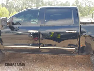 2014 Chevrolet Silverado 1500 LTZ with VIN 3GCUKSEC7EG557551, listed as a IAAI auction lot 41936077 with 227,097 mi miles and . Bid and sale history available at DreamBid. Image 14.