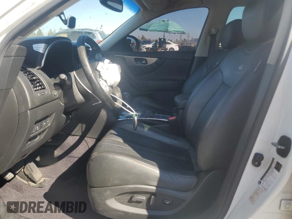 2011 Infiniti FX35 with VIN JN8AS1MU0BM710646, listed as a Copart auction lot 65397904 with 140,642 mi miles and Salvage Title. Bid and sale history available at carsss.com. Image 7.