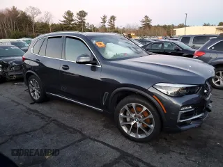 2021 BMW X5 sDrive40i with VIN 5UXCR4C03M9E13698, listed as a Copart auction lot 84158714 with 0 mi miles and Salvage Title. Bid and sale history available at carsss.com. Image 4.